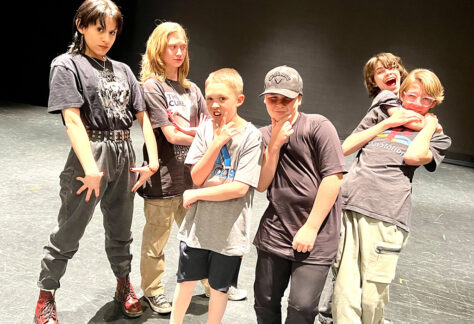 Six members of the Technical Theatre Team horsing around.
