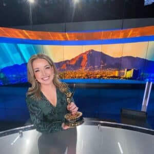 Megan Thomson with Emmy Award